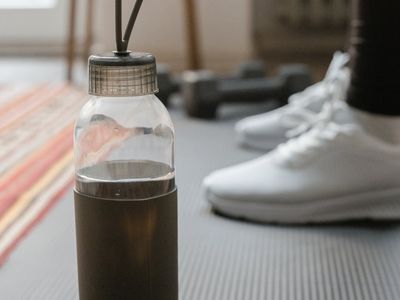 Close up of a yoga mat and water bottle